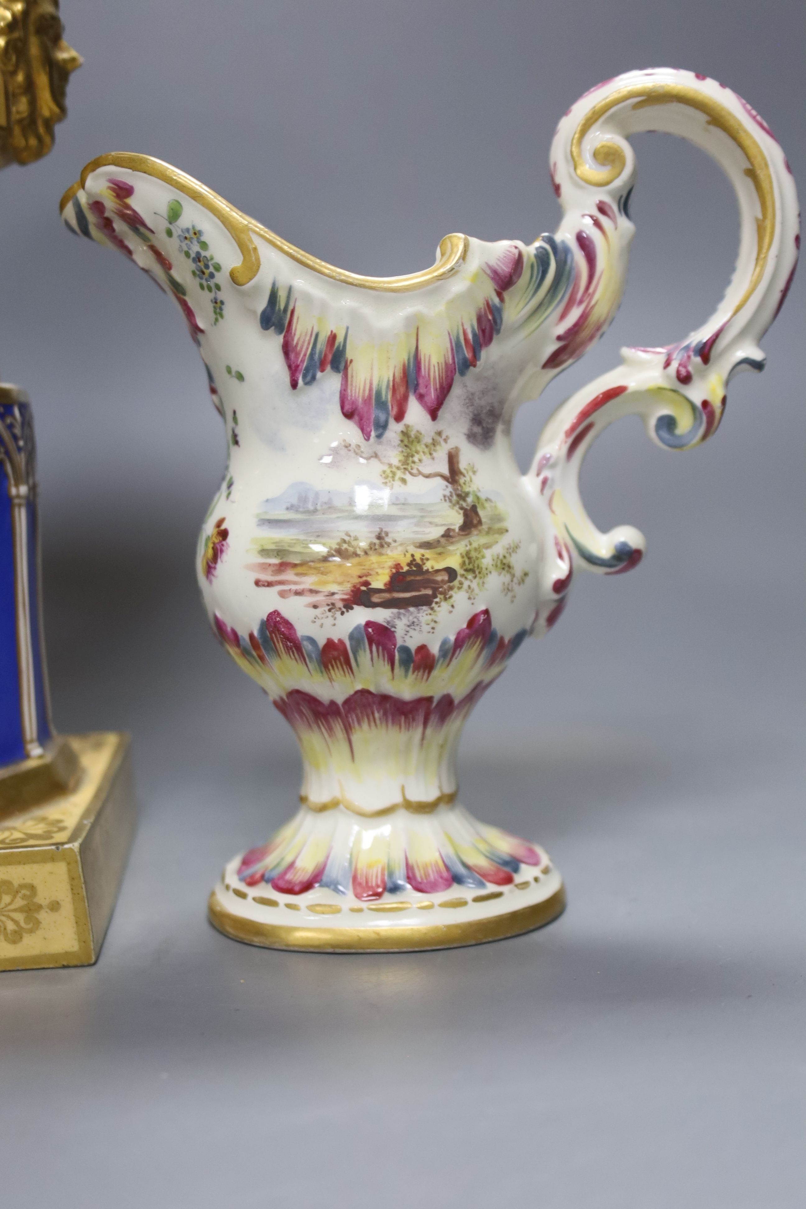 A 19th century French blue ground vase and a Lille faience cream jug, tallest 27cm